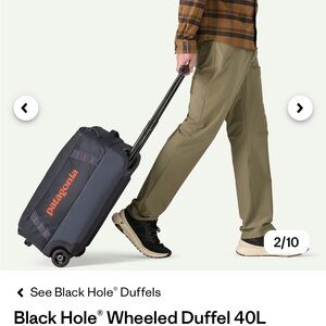 Patagonia Black Duffel Bag with Wheels in blue